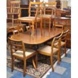 A Modern Twin Pedestal Oval Dining Table and Eight Chairs Including Two Carvers, No Leaves