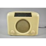 A Vintage Cream Bakelite Bush Radio, 30cm wide