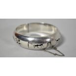 A Mexican Silver Bangle, Stamped 925 Decorated with Matadors and Picadors