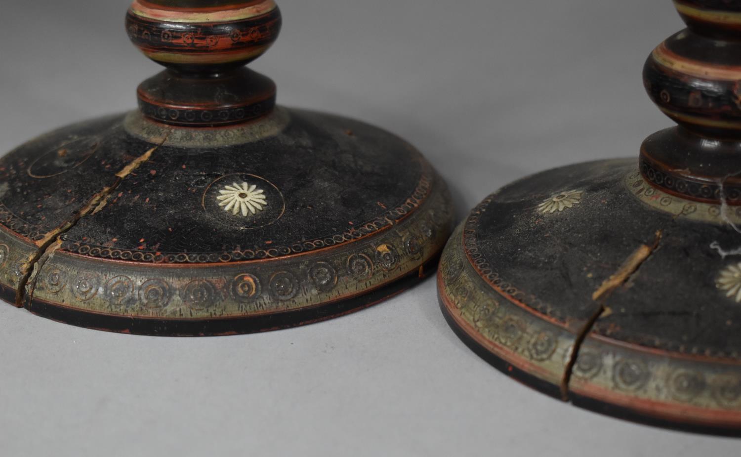 A Pair of Turned Oriental Lacquered Candlesticks, both Have Splits to Base, 24cm high - Image 3 of 3