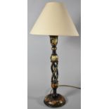 A Floral Painted Papier Mache Spiralled Table Lamp, with Shade, 42cm high