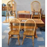 A Rectangular Refectory Style Pine Dining Table and Four Spindle Back Chairs, Together with a