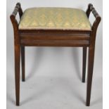 An Edwardian Lift Top Piano Stool with Turned Handles, 51cm wide