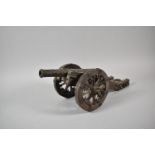 A Metal Mounted Wooden Model of a Spanish Cannon, 40cm Long