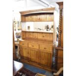 A Late 20th Century Pine Kitchen Dresser, Base with Three Short Drawers Over Cupboards, Two Shelf