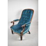 A Late Victorian Mahogany Framed Scroll Arm Buttoned Upholstered Ladies Armchair