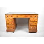 A Late 19th Century Mahogany Kneehole Desk Having Tooled Leather Top, Centre Drawer and Two Banks of