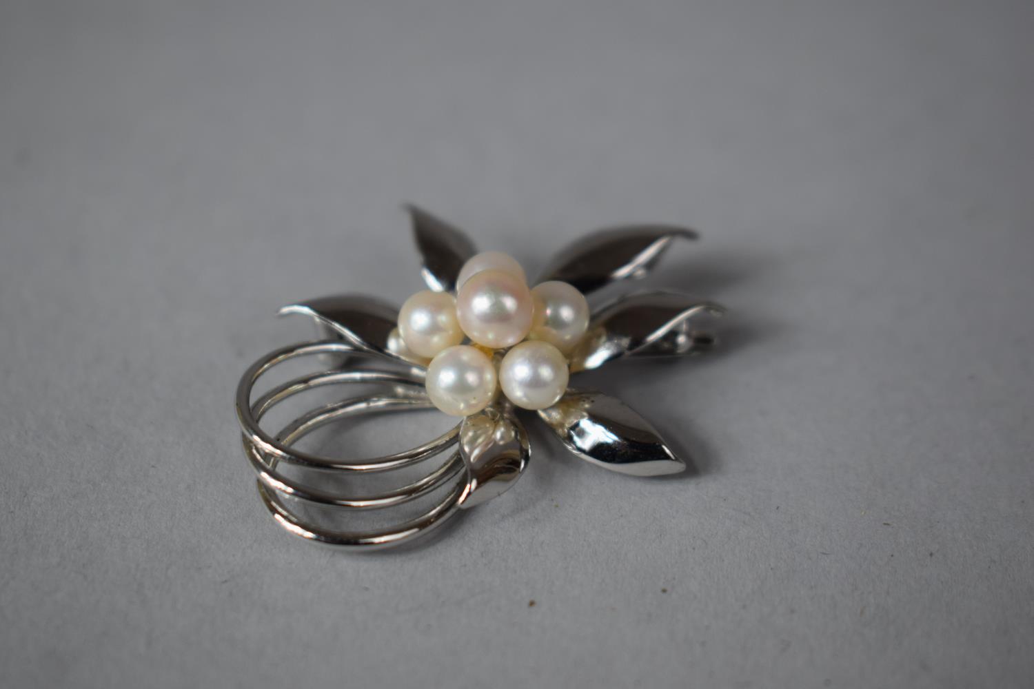 A Stylised Silver Flower Head Brooch, Stamped Silver