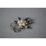 A Stylised Silver Flower Head Brooch, Stamped Silver