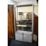 A Modern Glazed and Illuminated Shop Display Cabinet with Three Inner Glass Shelves and Cupboard