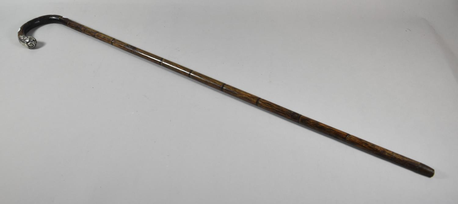 A Silver Mounted Bamboo Walking Cane, London 1913, Engraved and Etched Ivy Pattern Decoration,