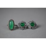 A Pair of Screw Back Silver Earrings and Matching Ring with Green Cabochon Stones