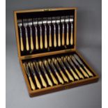 A Cased Set of Twelve Bone Handled and Silver Plated Fish Knives and Forks by Rodgers