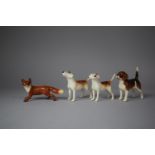 A Beswick Fox, Beswick Beagle and Two Beswick Fox Hounds (Second Editions)