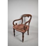 A 19th Century Mahogany Framed Scroll Arm Chair