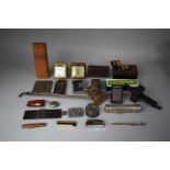A Collection of Curios to Include Cash Tin, Scribing Tool, Alarm Clock, Pocket Binoculars, Leather