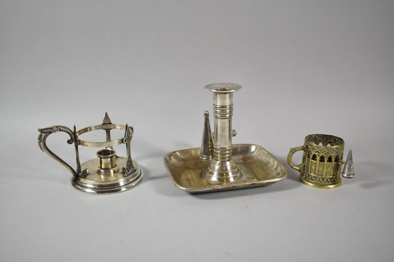 Two Late Victorian Silver Plated Bedchamber Sticks and a Small Pierced Brass Example with Snuffer