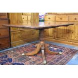 A 19th Century Mahogany Rectangular Topped Breakfast Table on Splayed Supports Culminating In