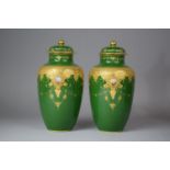 A Pair of French Limoges Gilt Decorated Green Glazed Lidded Vases, 20.5cm high, One with Chip to Rim