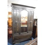 An Edwardian Oak Mirror Fronted Wardrobe with Base Drawer, 132cm Wide