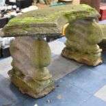 A Reconstituted Stone Garden Bench of Crescent Form on Dolphin Supports, 97cm Wide