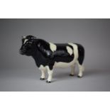 A Beswick Friesian Bull, Coddington Hilt Bar