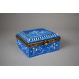 A Continental Blue Glazed Porcelain Box Decorated in Relief with Cherubs to Lid, AF, 11cm Square