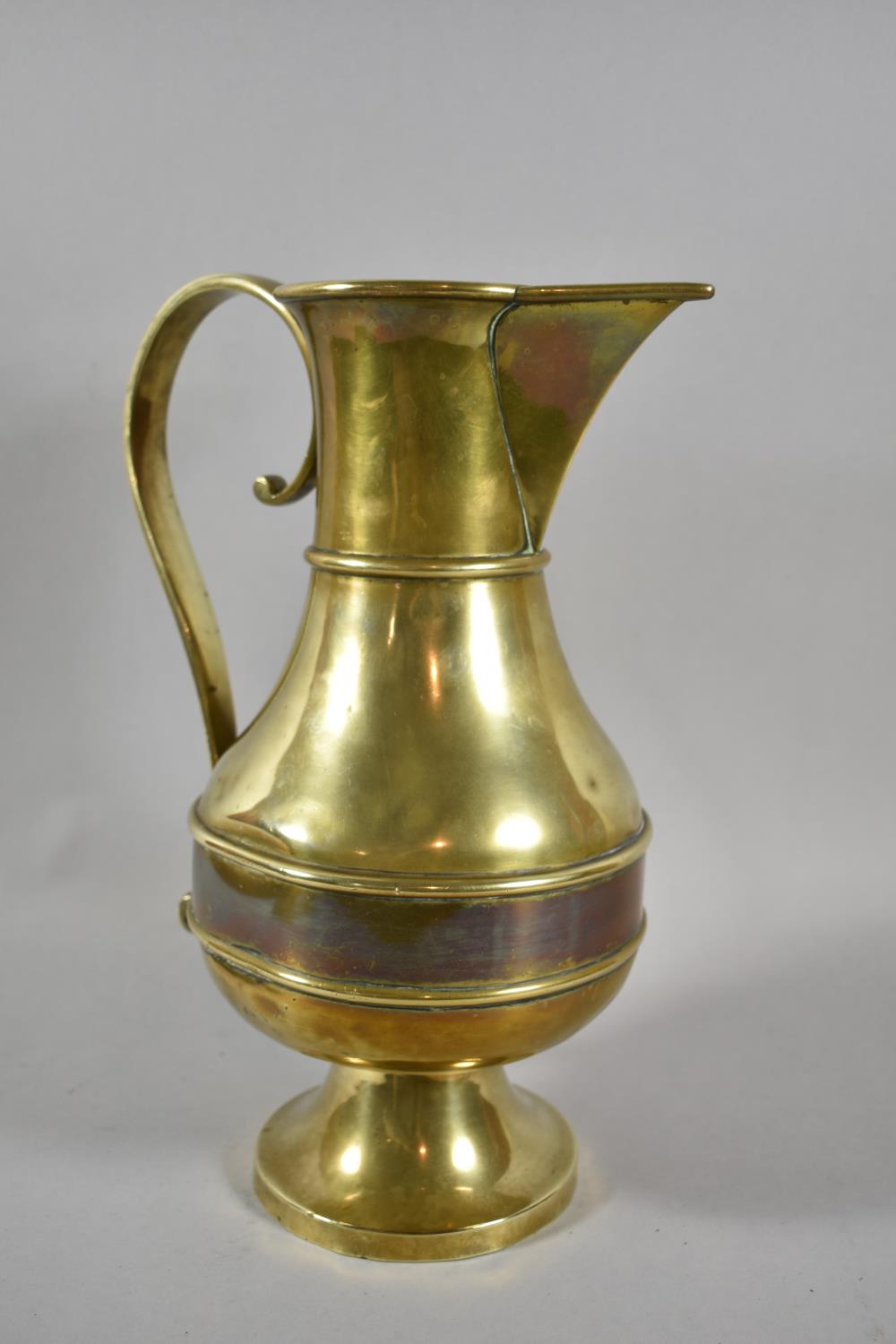 A Large 19th Century Brass Ewer, 33cm High