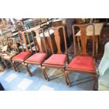 A Set of Four Queen Anne Style Mahogany Dining Chairs