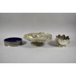 An Edwardian Silver Plated Basket, Two Handled Sugar Bowl and Pierced Oval Dish with Blue Glass