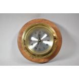 A Modern Brass Circular Miniature Ships Clock Mounted on Wooden Surround, 17.5cm Diameter