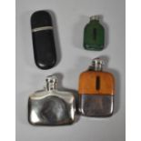 A Collection of Four Various Hip Flasks