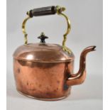A Vintage Copper Kettle with Brass and Turned Wooden Handle, 21cm high