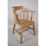 A Vintage Smoker's Bow Armchair