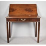 A 19th Century Mahogany Lift Top Tea Table with Small Centre Drawer Set on Chamfered Square Legs,