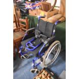 A Folding Wheelchair