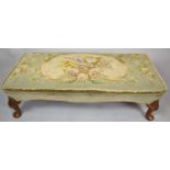 A Rectangular Tapestry Upholstered Footstool on Short Cabriole Supports, 96cm wide