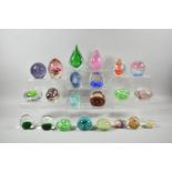 A Collection of Various Coloured Glass Paperweights