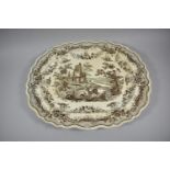 An Antiquarian Pattern Meat Dish in Sepia, 50cm wide