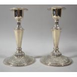 A Pair of Canadian Silver Plated Candlesticks, 20cm high