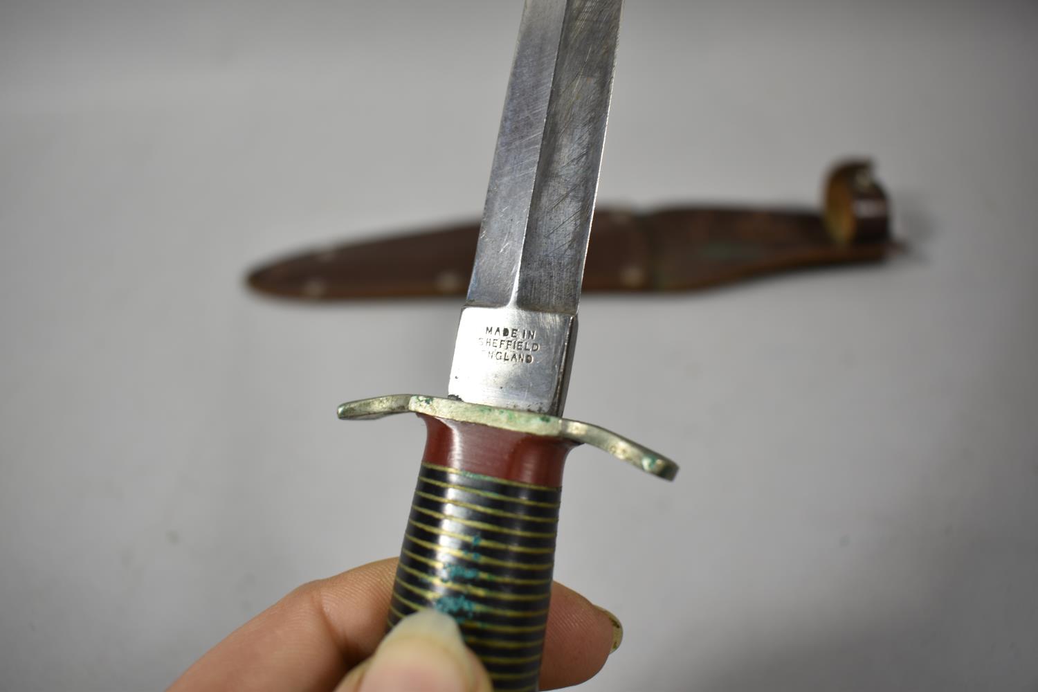 A WWII Commando Dagger by Fagan and Son., Sheffield Together with Leather Scabbard - Image 4 of 5