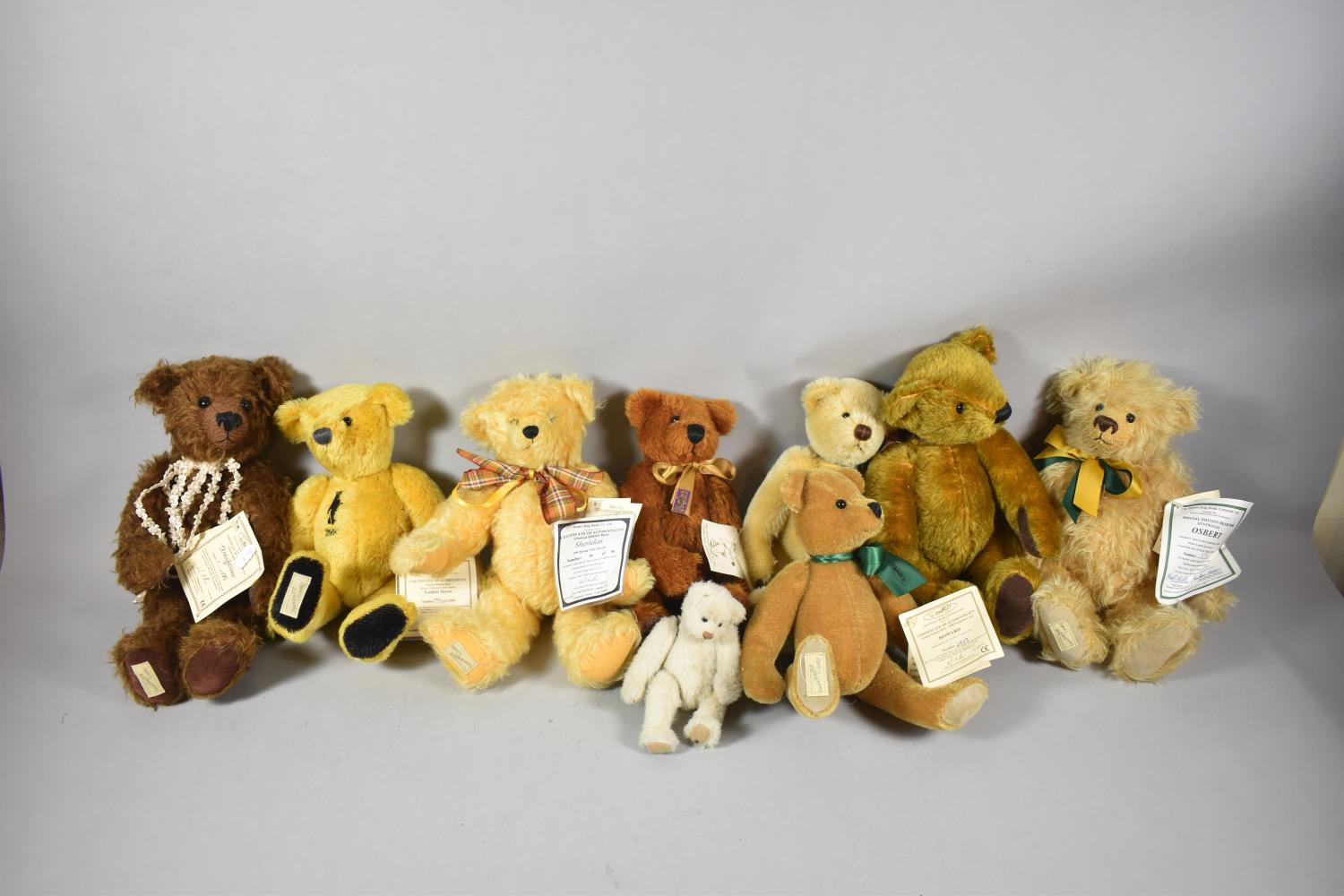 A Collection of Nine Deans Bears to Include Stringfellow 1/100, Osbert no.176, Hardy no.3182, Hobson