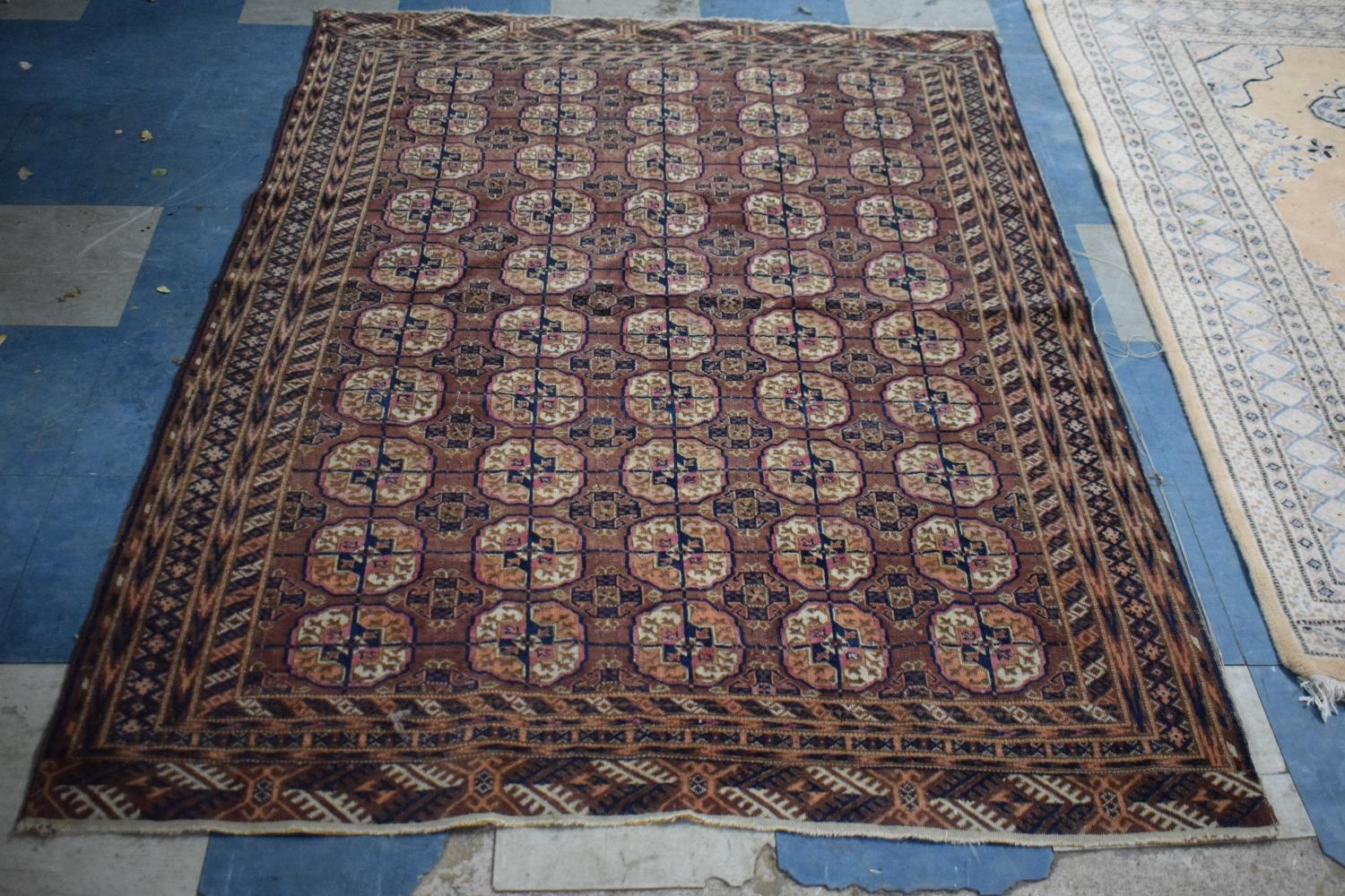 A Patterned Woollen Rug, 180x135cm