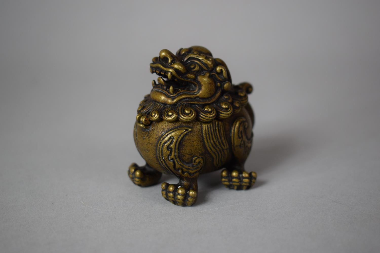 A Chinese Bronze Incense Burner in the Form of a Temple Lion, 5.5cm high