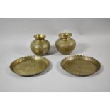 Two Indian Brass Vases and Pair of Lotus Bordered Circular Dishes Decorated with Ganesha and Other