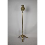 A Vintage Brass Oil Lamp on Tripod Stand