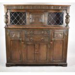 A 20th Century Oak Court Cupboard with Two Central Drawers Over Cupboard Flanked by Two Cupboards,