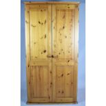A Modern Pine Two Door Wardrobe, 89cm wide