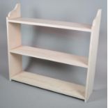 A Cream Painted Three Shelf Open Waterfall Bookcase, 91cm wide