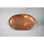 An Hugh Wallis Arts and Crafts Oval Copper Tray with Brass Handles, Central Foliate Decoration in